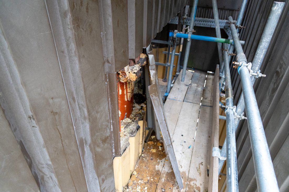 A pest and access problem reached safely from scaffolding on a commercial structure