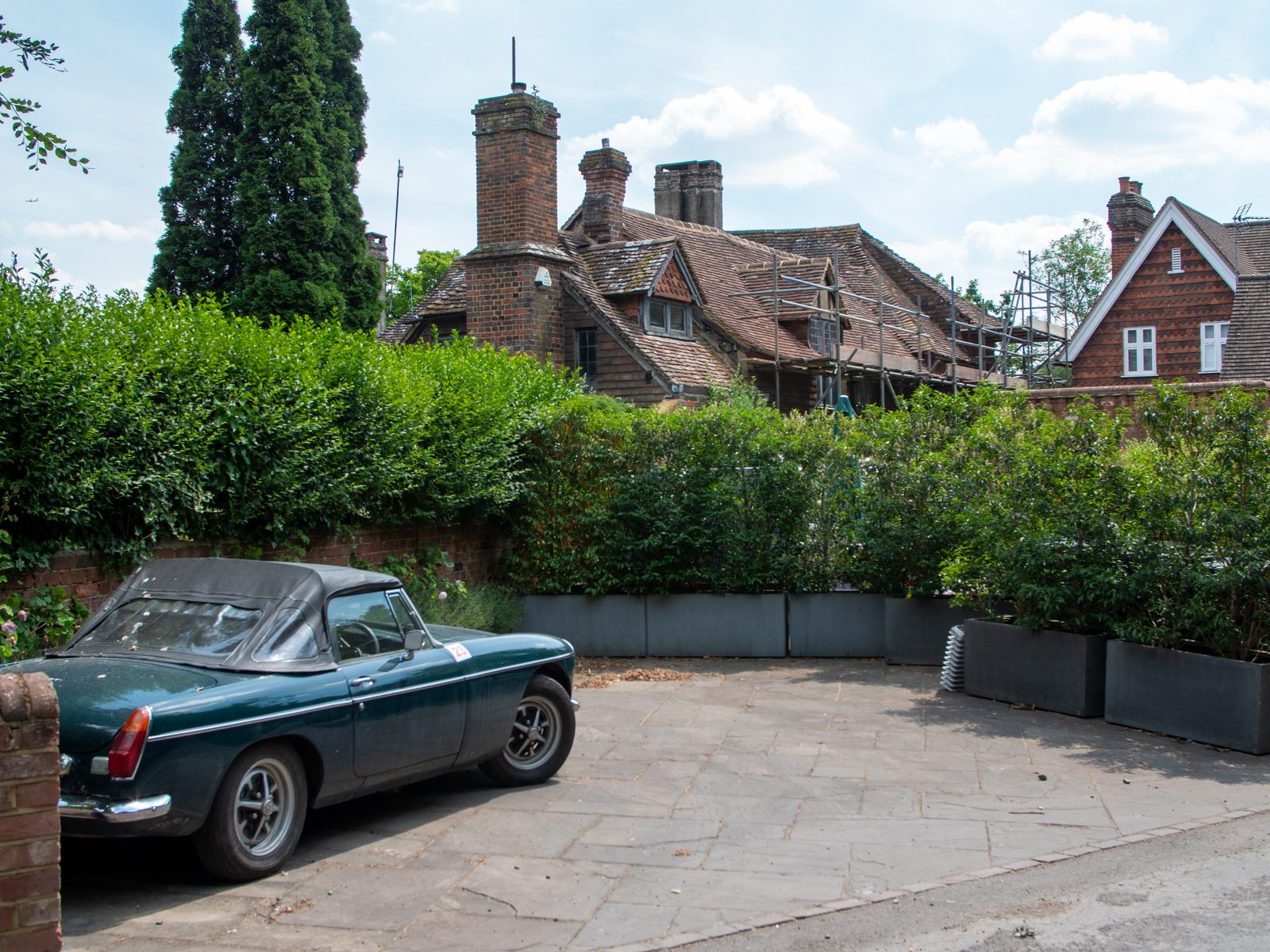 A heritage country property under roof renewal, with scaffolding in place