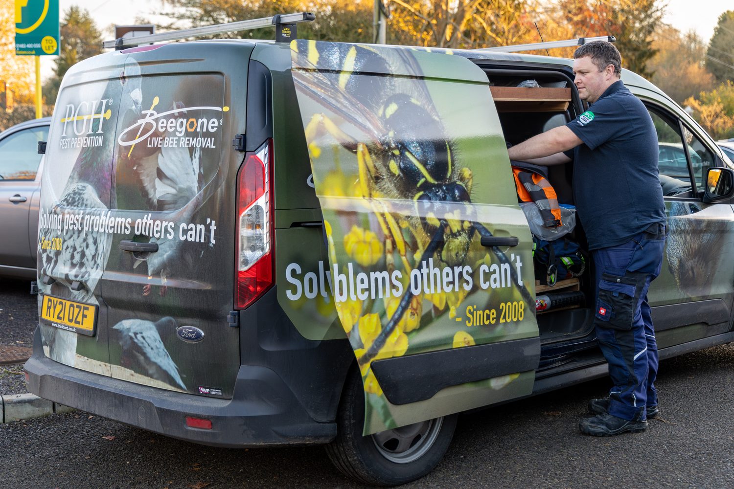 A directly-employed Thornemere technician loading equipment into a liveried company van